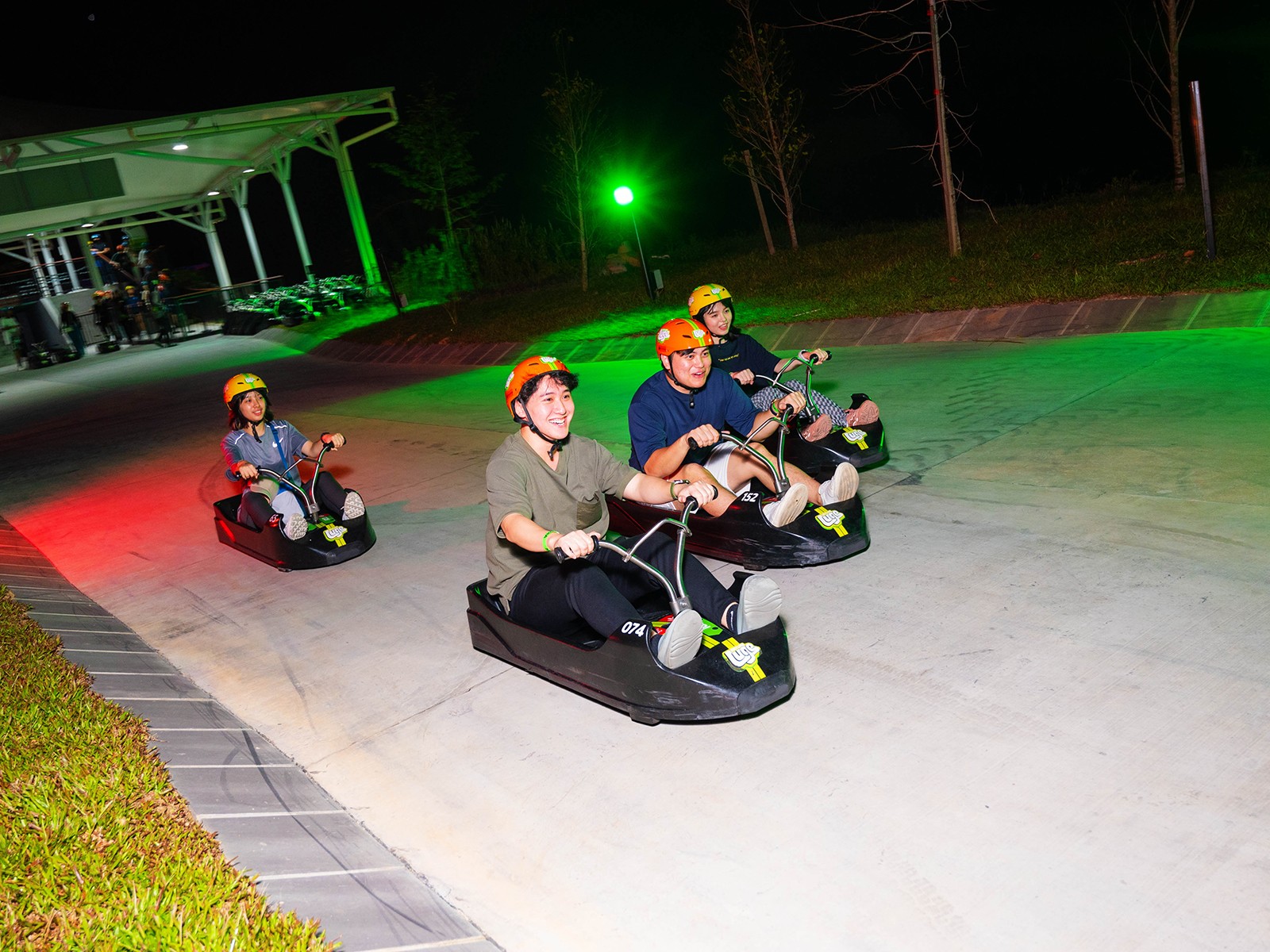 Riders on Skyline Luge Kuala Lumpur at night