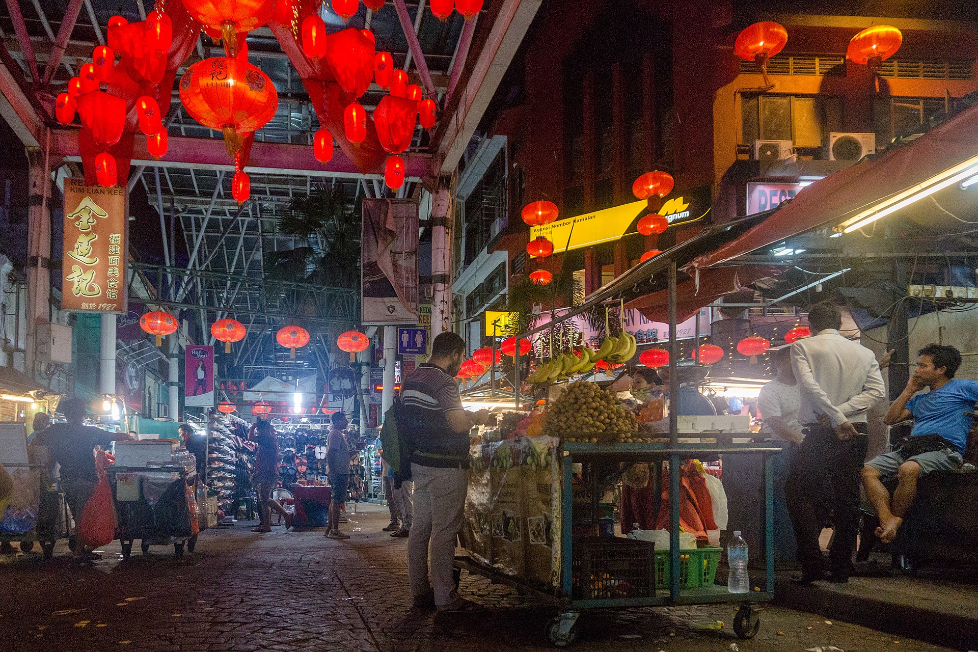 Petaling Street night market under red lanterns in Kuala Lumpur