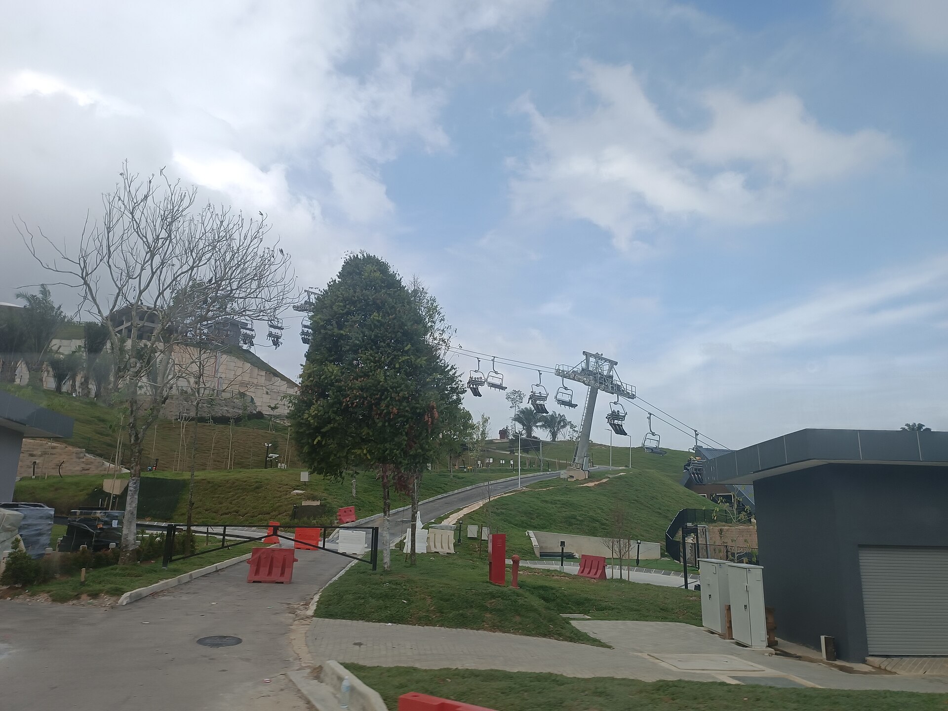 Skyline Luge Kuala Lumpur tracks and Skyride on a green hillside